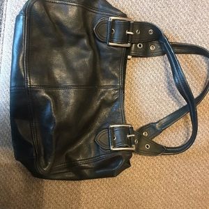 Black leather hand bag.